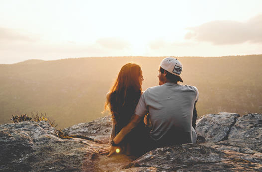 alt=woman and man together outside
